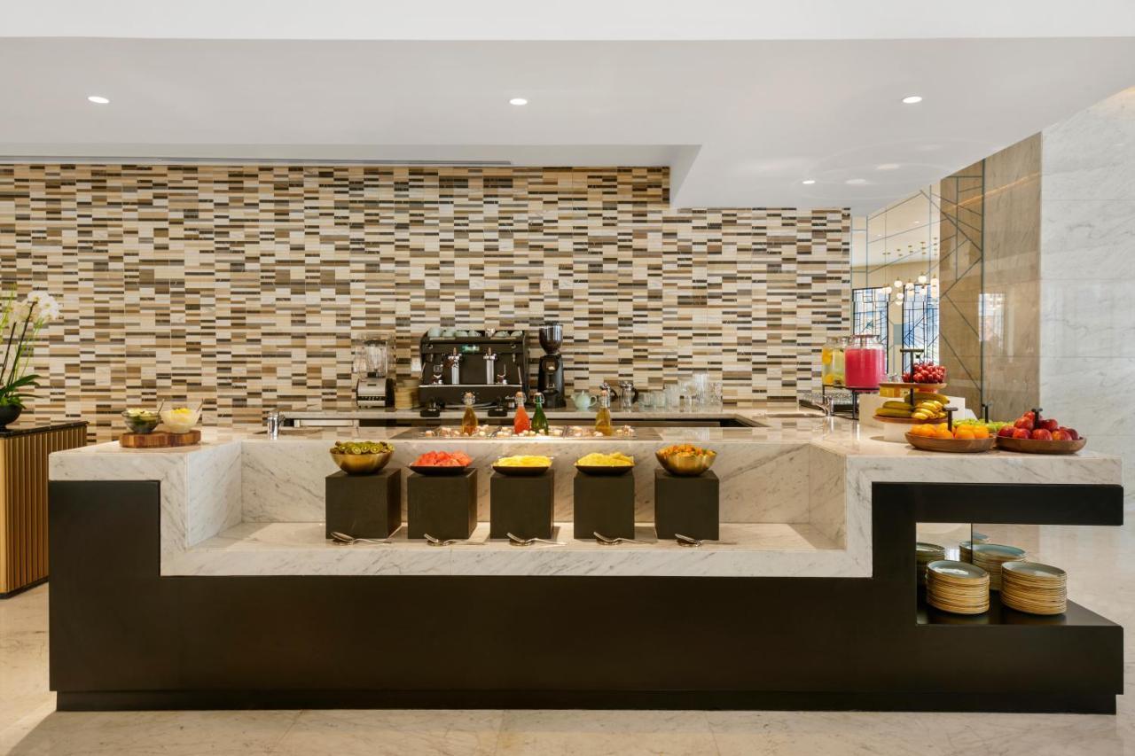 Wyndham Grand Doha West Bay Beach Exteriör bild The Coffee Shop